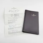 Patek Philippe Nautilus 3800/1J-017 Yellow Gold Black Dial (2003) - Image 25